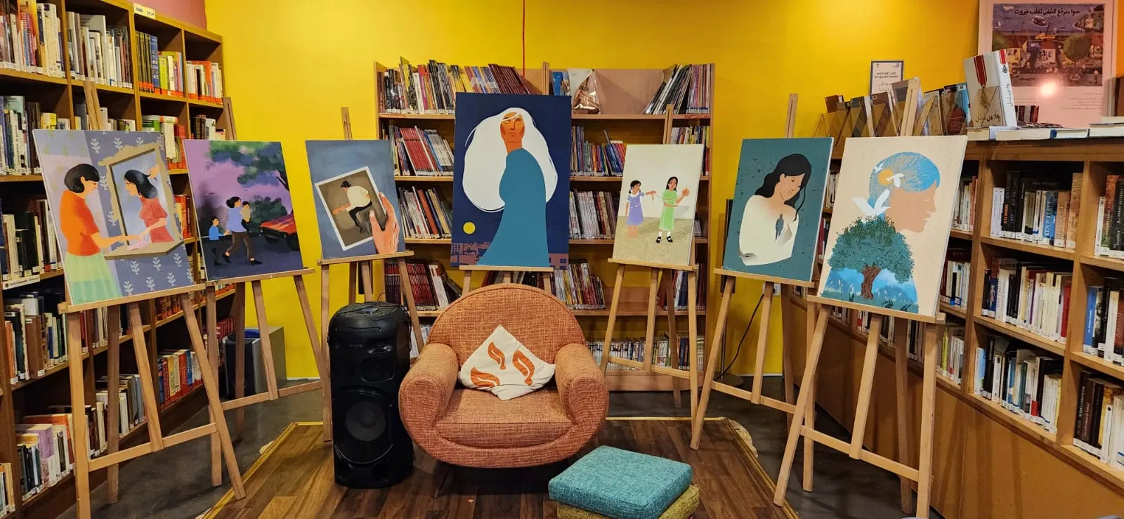 The book’s illustrations exhibited on easels in a bookshop