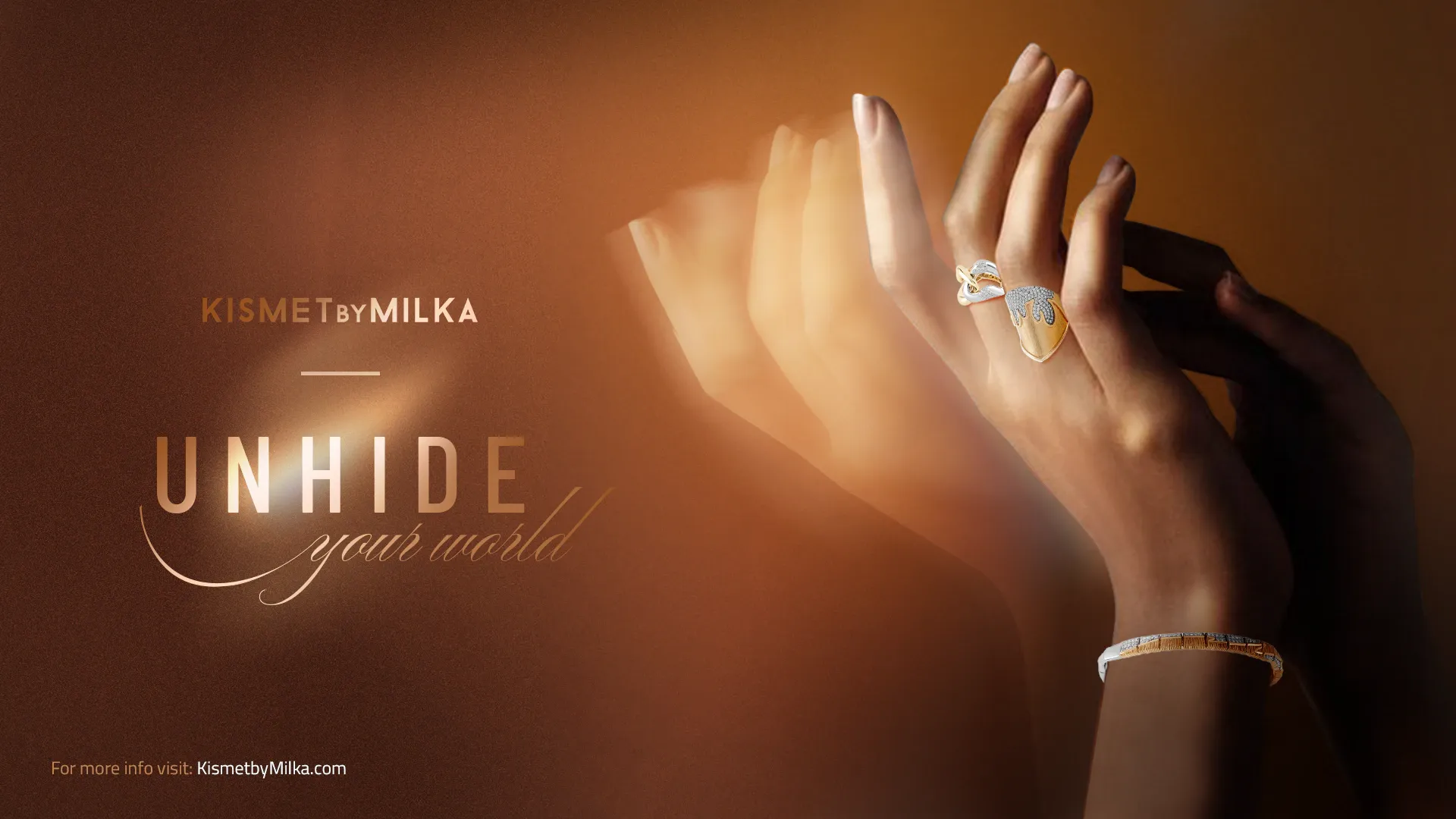 Unhide key visual: double-exposure hands wearing a Kismet ring and bracelet on amber